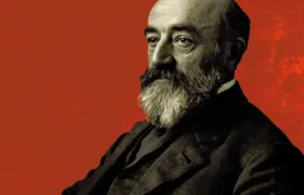 Marcus Goldman portrait, bearded founder in dark suit on red background