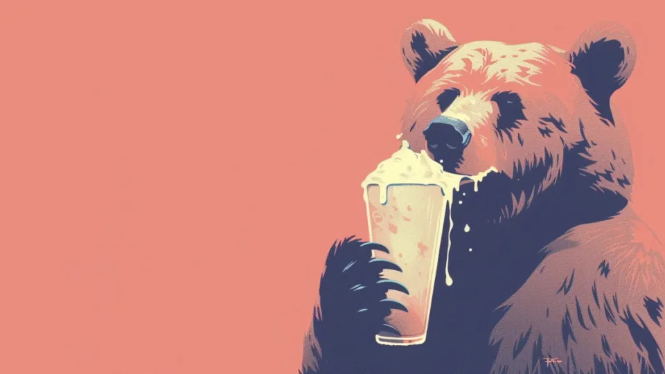 Rooty the Bear mascot holding a frothy root beer glass