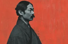Meiji-era Japanese man in kimono photographed in profile against red