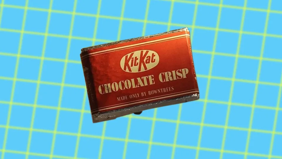 Vintage Rowntree's Kit Kat Chocolate Crisp wrapper on blue grid