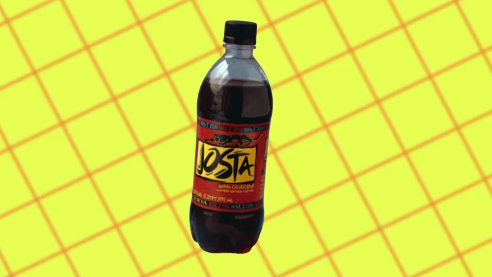 Josta soda bottle with red jaguar label on green grid