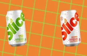 White Slice lemon-lime and orange soda cans on an orange grid background