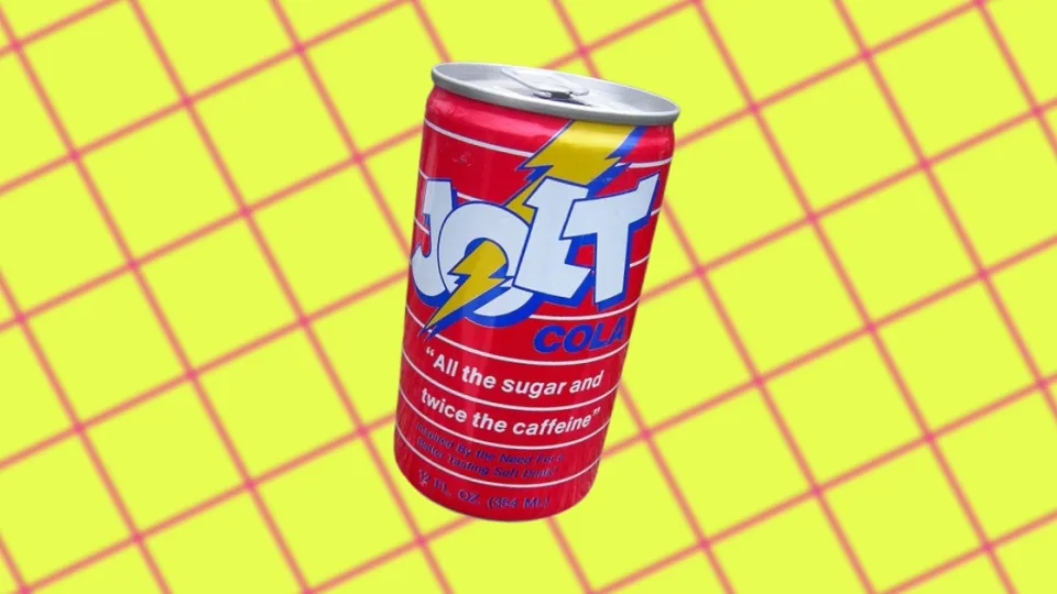 Red Jolt Cola can with lightning bolt logo and caffeine slogan