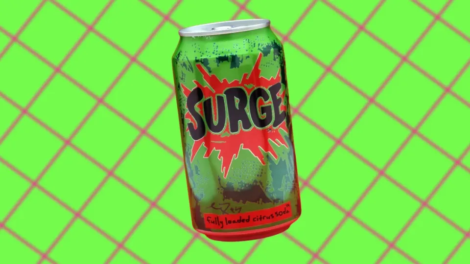 Dented green Surge soda can with red splash logo on green diamond grid