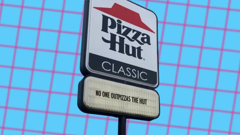 Pizza Hut Classic road sign reading No One OutPizzas The Hut