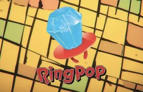 Blue diamond Ring Pop candy above the RingPop logo