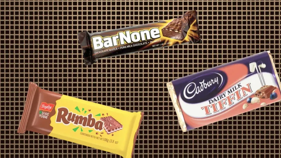 BarNone, Rumba, and Cadbury Tiffin bar wrappers on brown grid