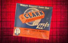 Vintage Clark Bar ad card reading World's Greatest Candy Bar