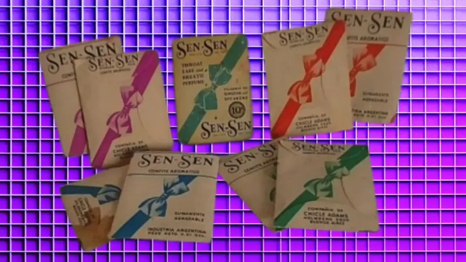 Vintage Sen-Sen breath mint packets from Argentina on purple grid background