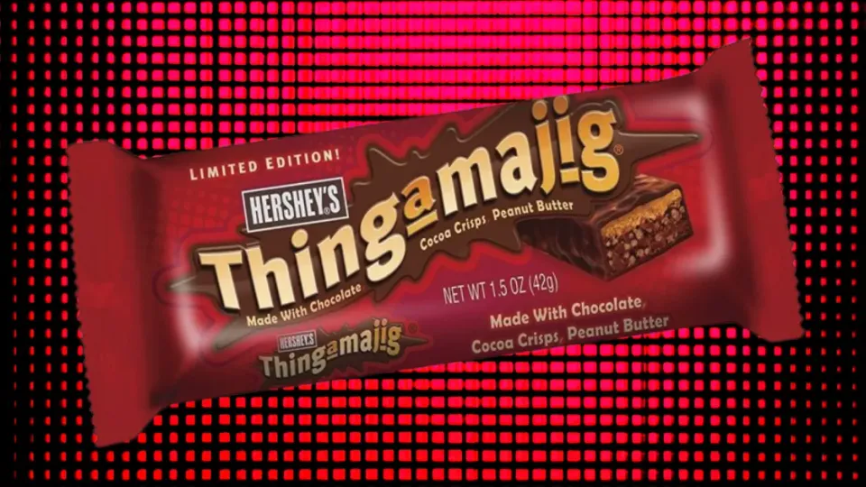 Hershey's Thingamajig candy bar wrapper on a red halftone background