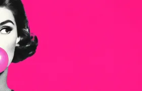 Vintage halftone woman blowing a pink bubble gum bubble on pink background