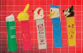Vintage PEZ dispensers including Bozo, Donald Duck, and Mickey Mouse
