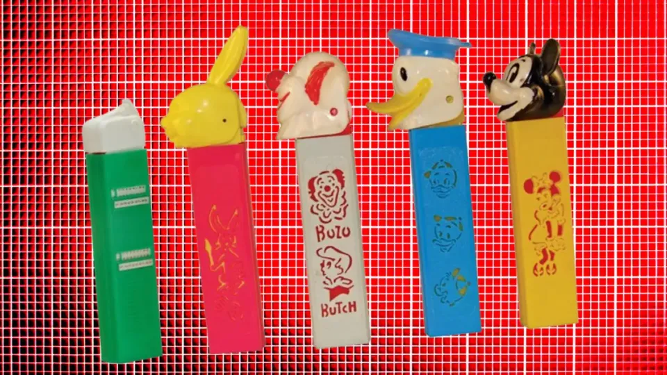 Vintage PEZ dispensers including Bozo, Donald Duck, and Mickey Mouse