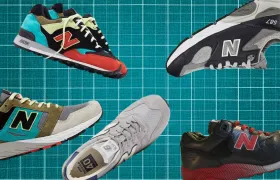 Five vintage New Balance sneakers in mixed colorways on teal grid