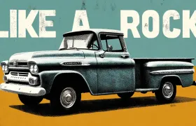 Vintage Chevrolet pickup truck under bold Like a Rock lettering