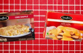 Stouffer’s Corn Soufflé and Welsh Rarebit frozen dinner boxes on red check