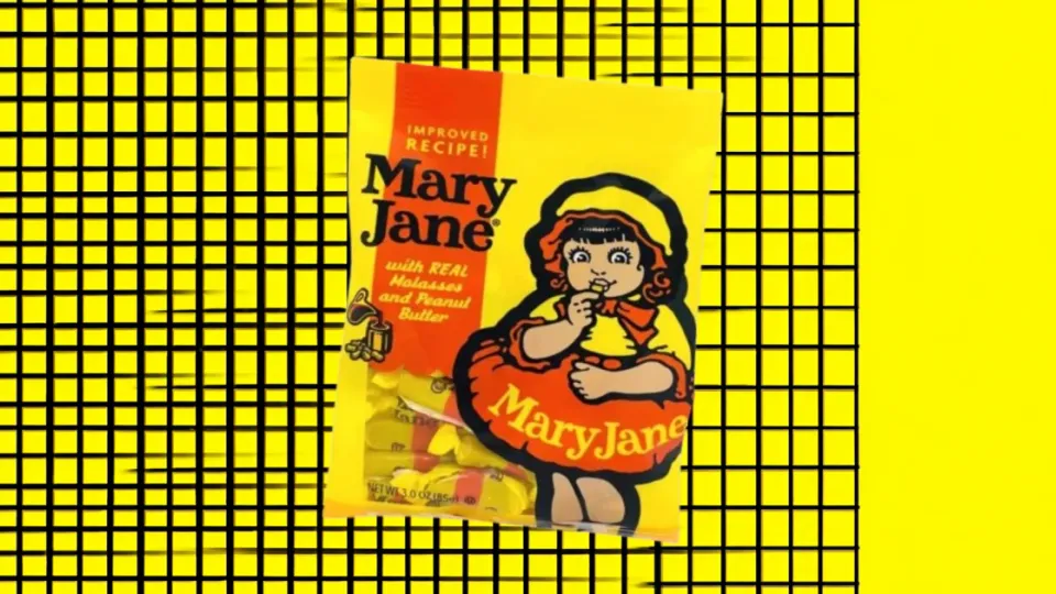 Mary Jane candy bag with bonnet girl mascot on yellow