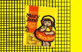 Mary Jane candy bag with bonnet girl mascot on yellow