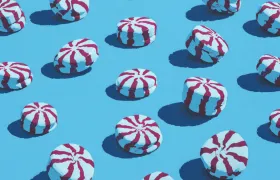 Red and white striped starlight peppermint candies on a blue background