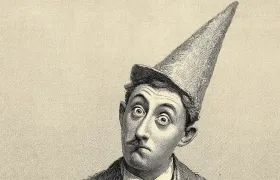Engraving of a wide-eyed man wearing a tall dunce cap